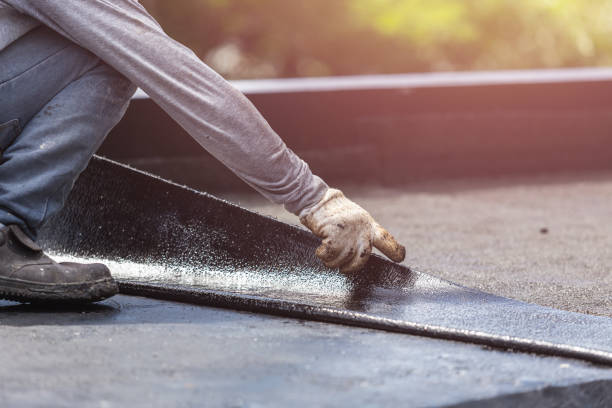 Professional Exterior Waterproofing technician working in Delong, IN